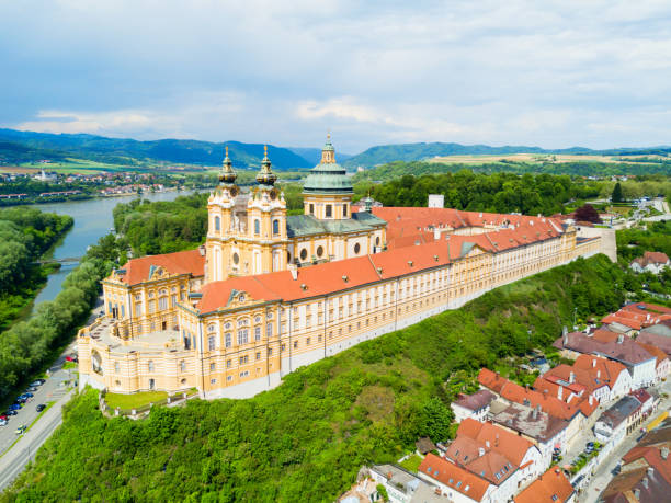 Melk Monastery aerial view Melk Abbey Monastery aerial panoramic view. Stift Melk is a Benedictine abbey in Melk, Austria. Monastery located on a rocky outcrop overlooking the Danube river and Wachau valley. abbey monastery photos stock pictures, royalty-free photos & images
