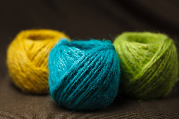 Blue, green, and yellow hemp cotton balls.