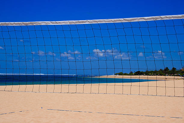 istock Blue sky through  volleyball net on the beach 94371051