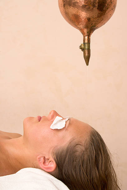 istock Shirodara oil treatment in spa 94371232