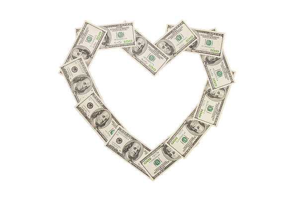 istock Heart made of hundred dollar banknotes isolated 94371236