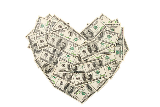 istock Heart made of hundred dollar banknotes isolated 94371256