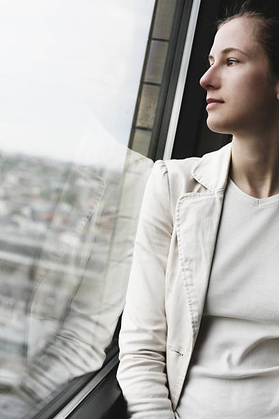 istock buisnesswoman at the window 94371542