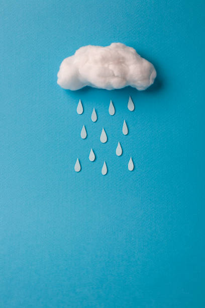 cotton cloud and raindrop on sky blue background cotton cloud and raindrop on sky blue background. cotton cloud stock pictures, royalty-free photos & images