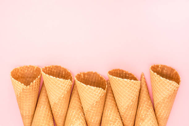 istock Ice cream cones on pink background 943719246