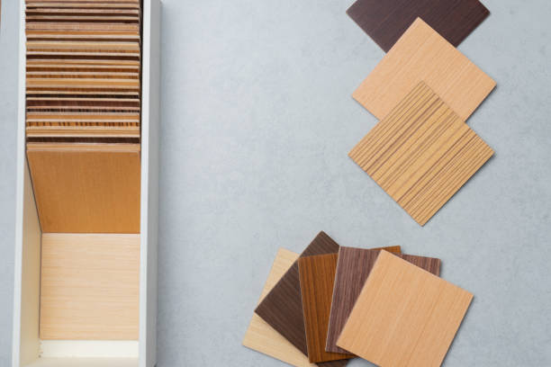 istock samples of material, wood , on concrete table.Interior design select material for idea. 943723728