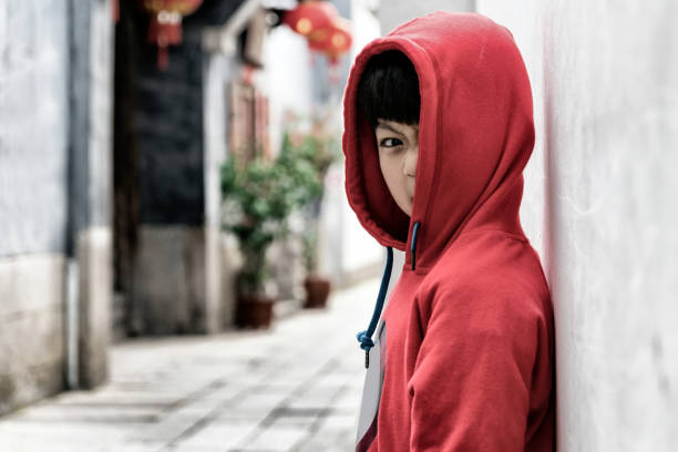 istock Asian little boy looking at camera 943730040