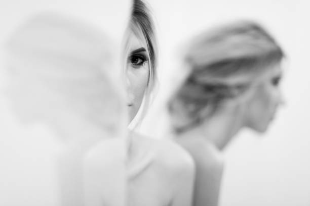 istock Reflections Of Beautiful Woman In Mirrors 943730528