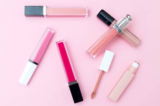 istock Lip gloss on a pink background. Geometric style 943736266