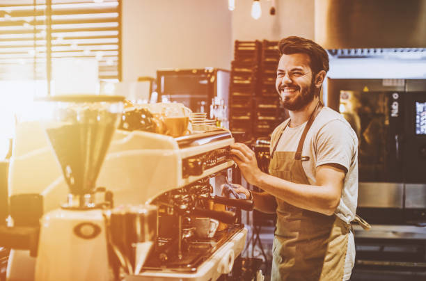 istock Young barista is making a coffee in cafe shop 943739592