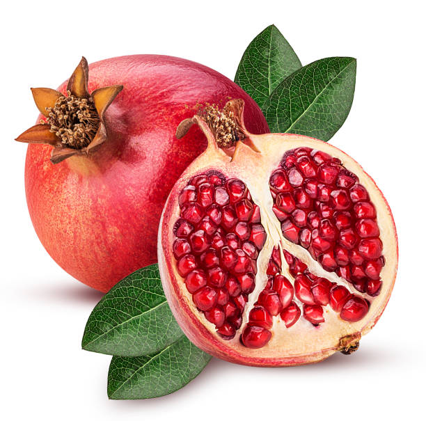 istock Ripe pomegranate fruit and one cut in half with leaf 943740174