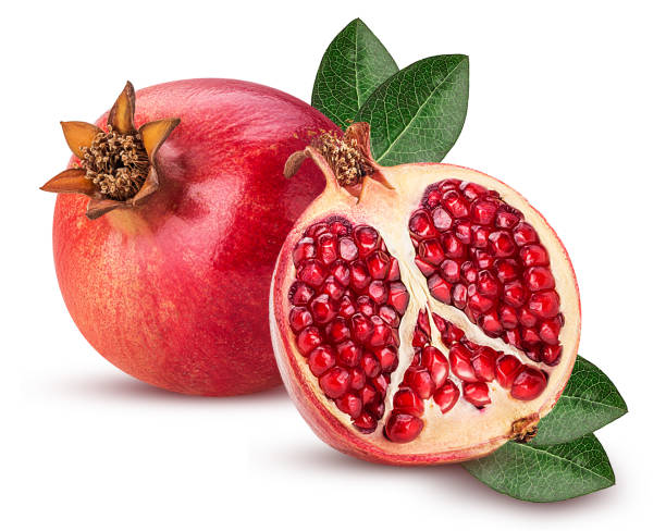 istock Ripe pomegranate fruit and one cut in half with leaf 943740588