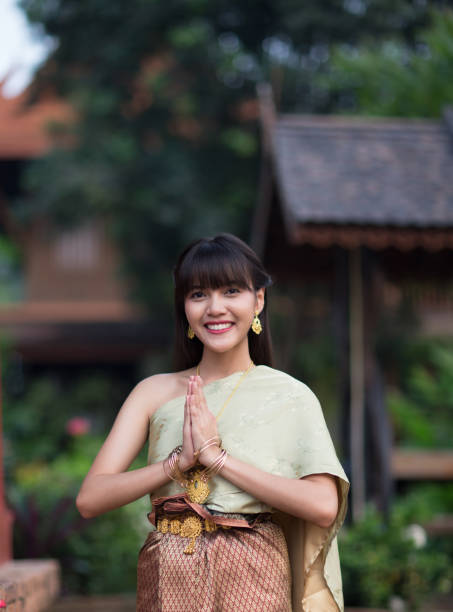 Beautiful smiling Thai girl with Thai ancient style dressing, Central region, Thailand