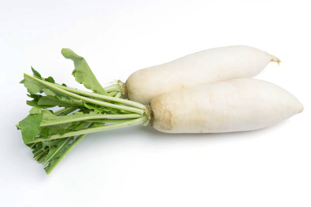 istock daikon radishes isolated on white background 943750818