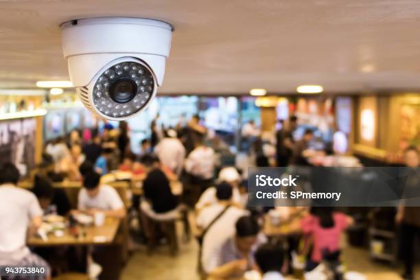Cctv System Security Inside Of Restaurantsurveillance Camera Installed On Ceiling To Monitor For Protection Customer In Restaurant Stock Photo - Download Image Now