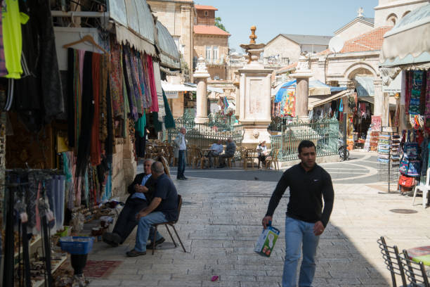 Jerusalem, Israel - April 11, 2014: People in the bazaar streets of Jerusalem, Israel