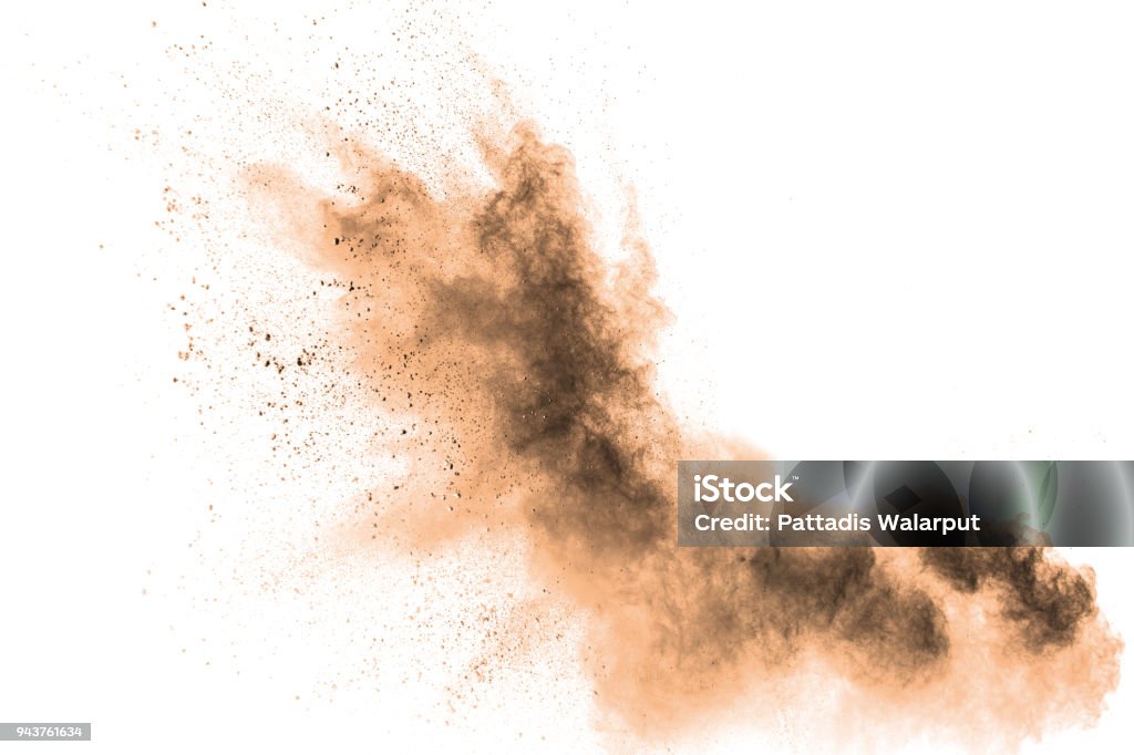 Abstract  brown colored sand splash on white background. Color dust explode on background  by throwing freeze stop motion. Dust Stock Photo