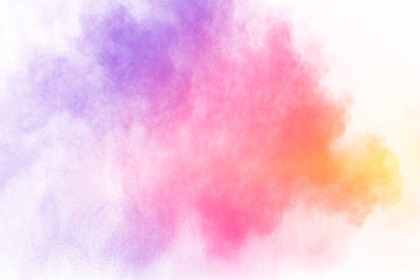 istock Abstract multi color powder explosion on white background.  Freeze motion of color dust  particles splashing. Painted Holi in festival 943761684