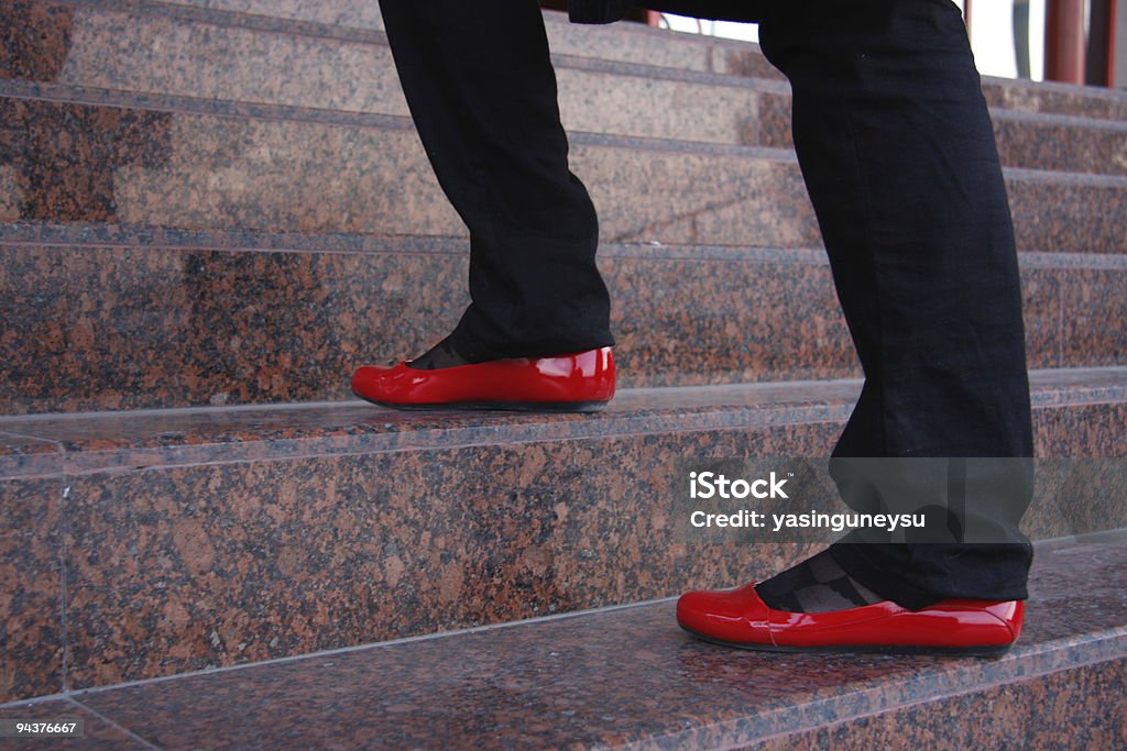 Chaussures rouge pas - Photo de Granit libre de droits