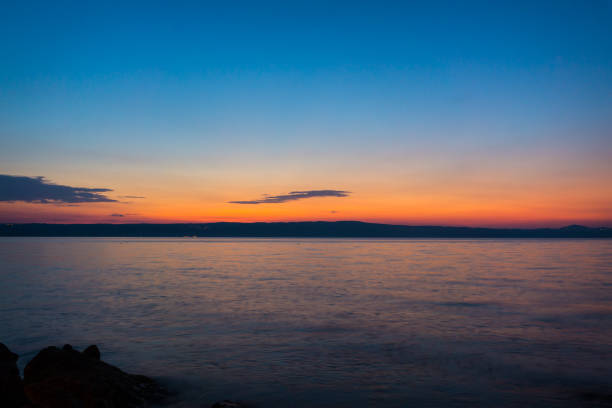 istock Sunset or sunrise at ocean beach landscape. 943786362