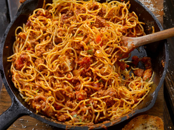 istock Pan Fried Spaghetti Bolognese with Mushrooms and Roasted Peppers 943786598