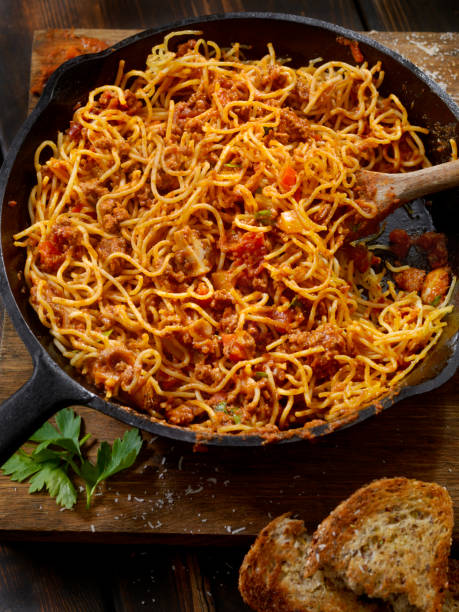 istock Pan Fried Spaghetti Bolognese with Mushrooms and Roasted Peppers 943787310