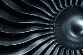 3D Rendering jet engine, close-up view jet engine blades. Blue tint.