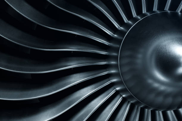 3d rendering jet engine, close-up view jet engine blades. blue tint. - turbina imagens e fotografias de stock