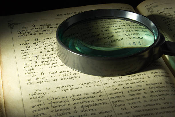 istock Old bible page and lens 94379006