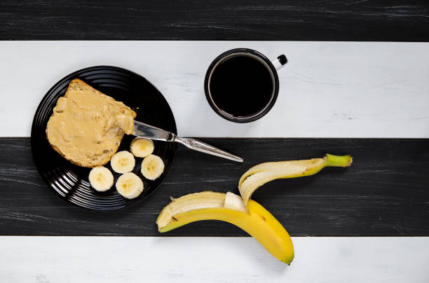 istock Peanut butter bread and banana with coffee for breakfast 943797994