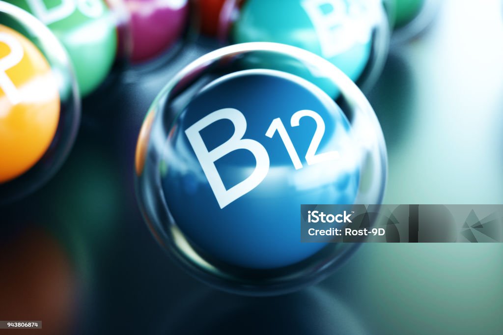 Vitamin B12, on black background. Symbol of health and longevity. 3d rendering Vitamin B12, on black background. Symbol of health and longevity, 3d rendering Vitamin B-12 Stock Photo