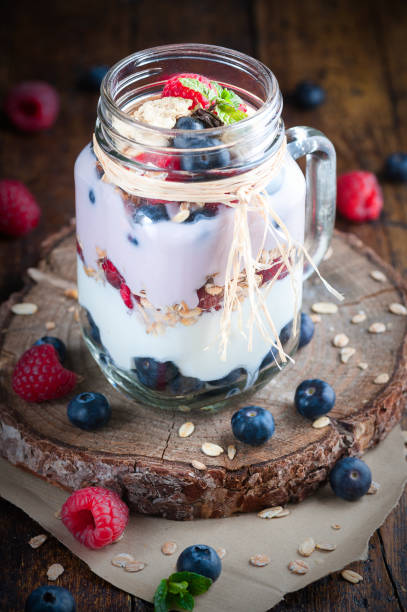 istock Fruit yoghurt with blueberries and red berries 943811392
