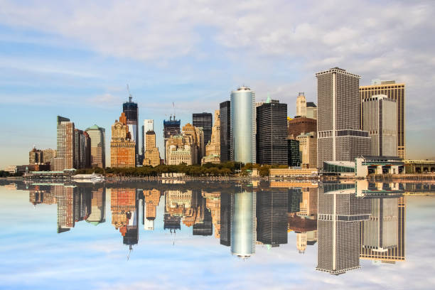 istock Beautiful Manhattan Cityscape with Reflection in Water 943814640