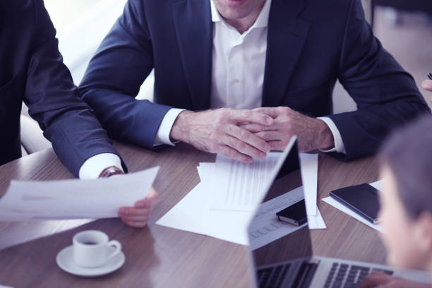 istock Business people working together at meeting 943814726