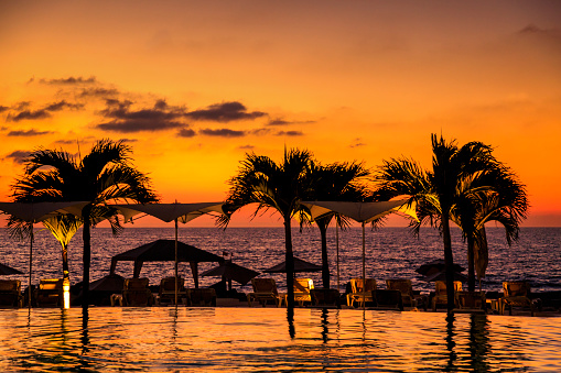 Puerto Vallarta, Mexico - 7th January, 2017.\nA sunset shot overlooking the swimming pool and beach
