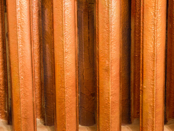 istock Bars of old copper heating radiator 943816018