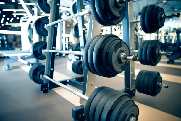 istock gym indoor interior with dumbbells 943819060