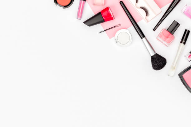 istock set of professional decorative cosmetics, makeup tools and accessory on white background with copy space for text. beauty, fashion, party and shopping concept. flat lay frame composition, top view 943821434