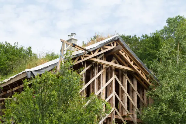 Photo of wood house skelet under construction