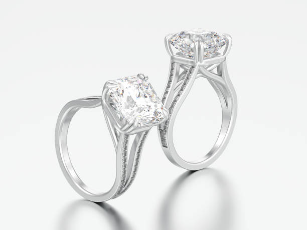 istock 3D illustration two white gold or silver engagement diamond rings 943825040