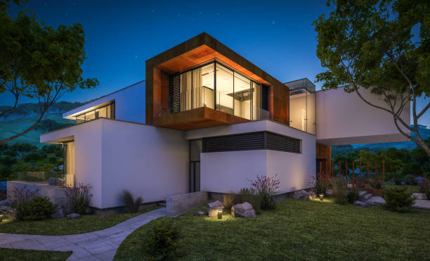 istock 3d rendering of modern cozy house by the river at night 943830346