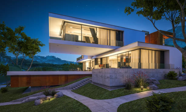 istock 3d rendering of modern cozy house by the river at night 943830362