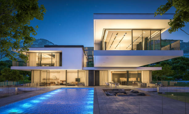 istock 3d rendering of modern cozy house by the river at night 943830422