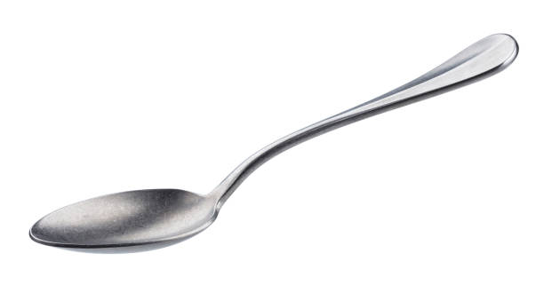 istock Metal spoon isolated on white background with clipping path 943830894