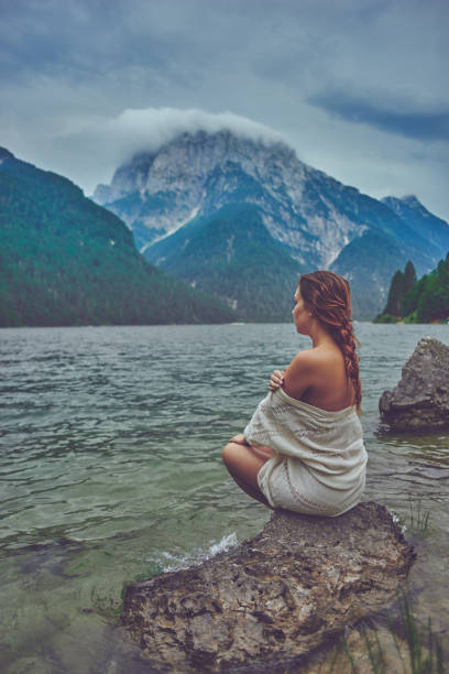 istock Lady at the lake 943845698