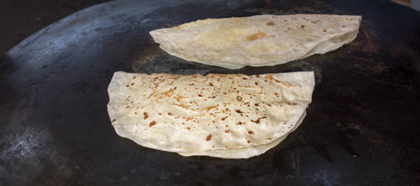 istock Making of traditional turkish gozleme pancake 943855554