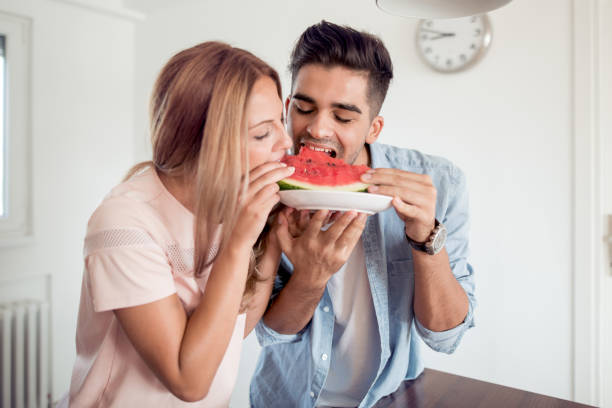 istock Happy young couple having great time together 943856120