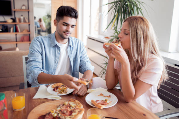 istock Happy young couple having great time together 943856170