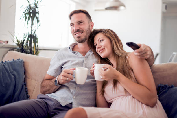 istock Romantic young couple at home 943869976