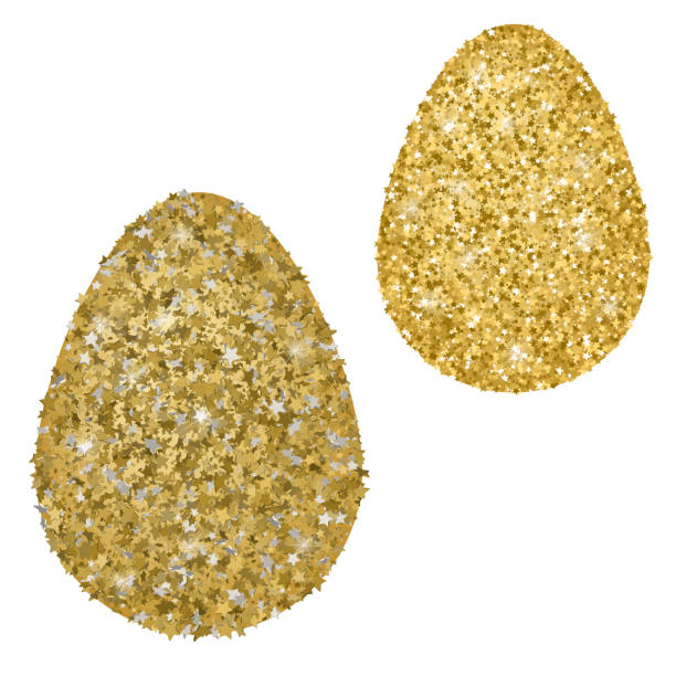 istock Perfect gold handmade easter eggs isolated on a white. Golden confetti concept 943875382